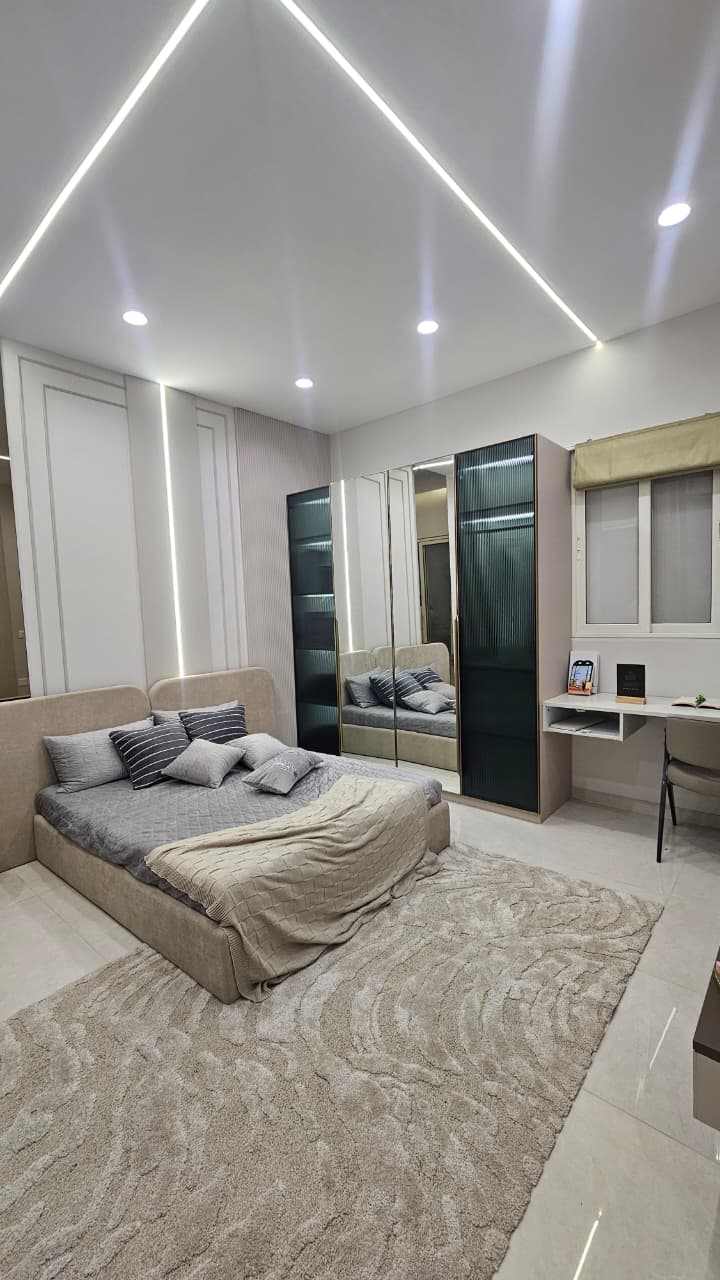 Master bedroom suite with scenic window view